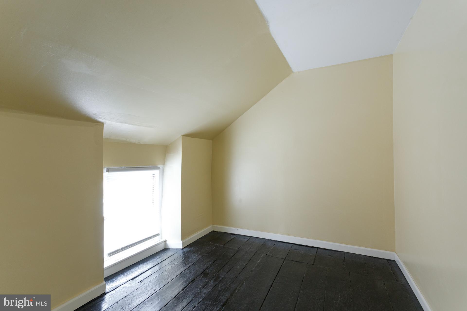108 Roxborough Avenue Philadelphia, PA 19127 - Photo 16 of 21 a view of an empty room and wooden floor