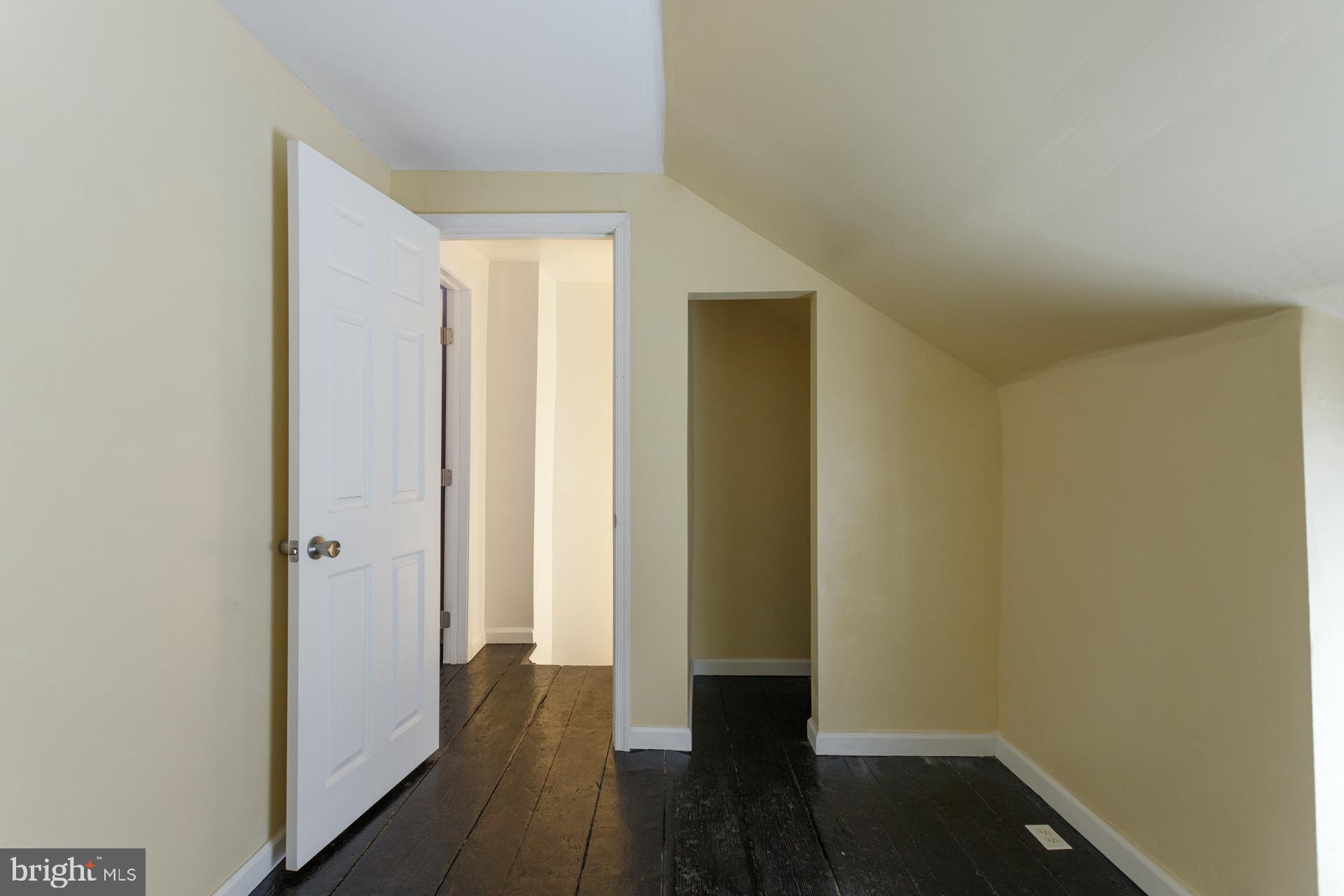 108 Roxborough Avenue Philadelphia, PA 19127 - Photo 17 of 21 a view of a hallway with wooden floor