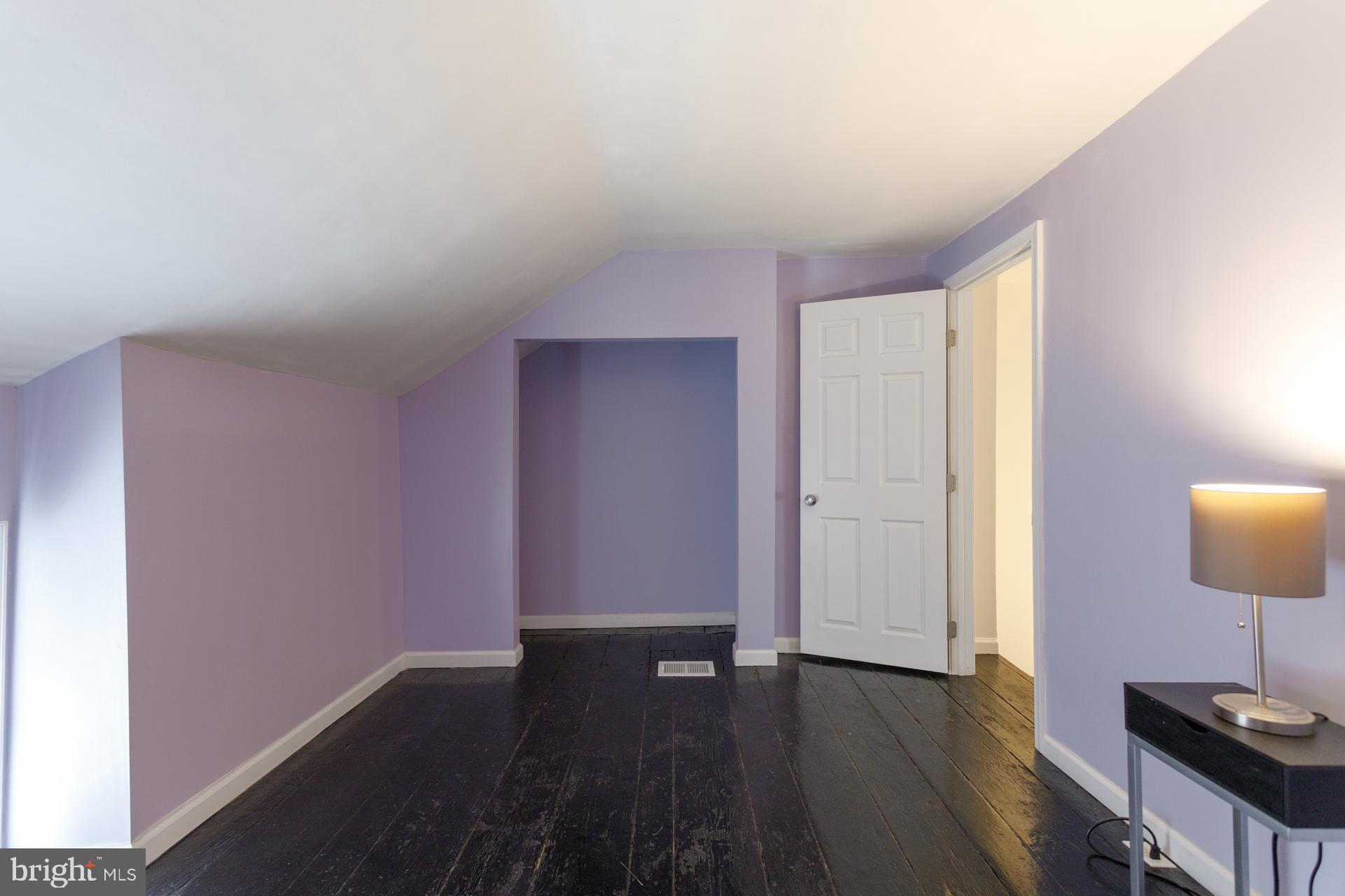 108 Roxborough Avenue Philadelphia, PA 19127 - Photo 18 of 21 a view of an empty room and wooden floor