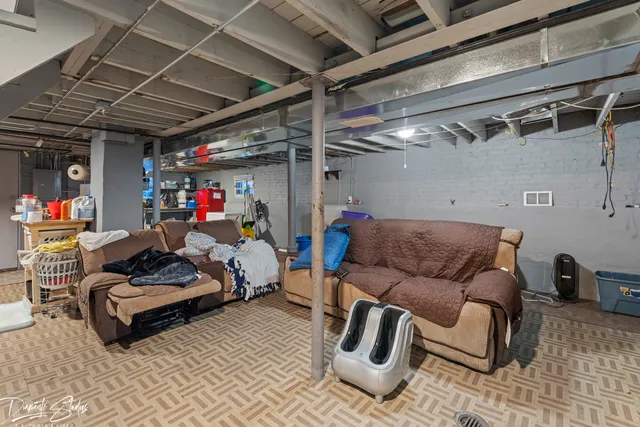 a living room with furniture and a couch