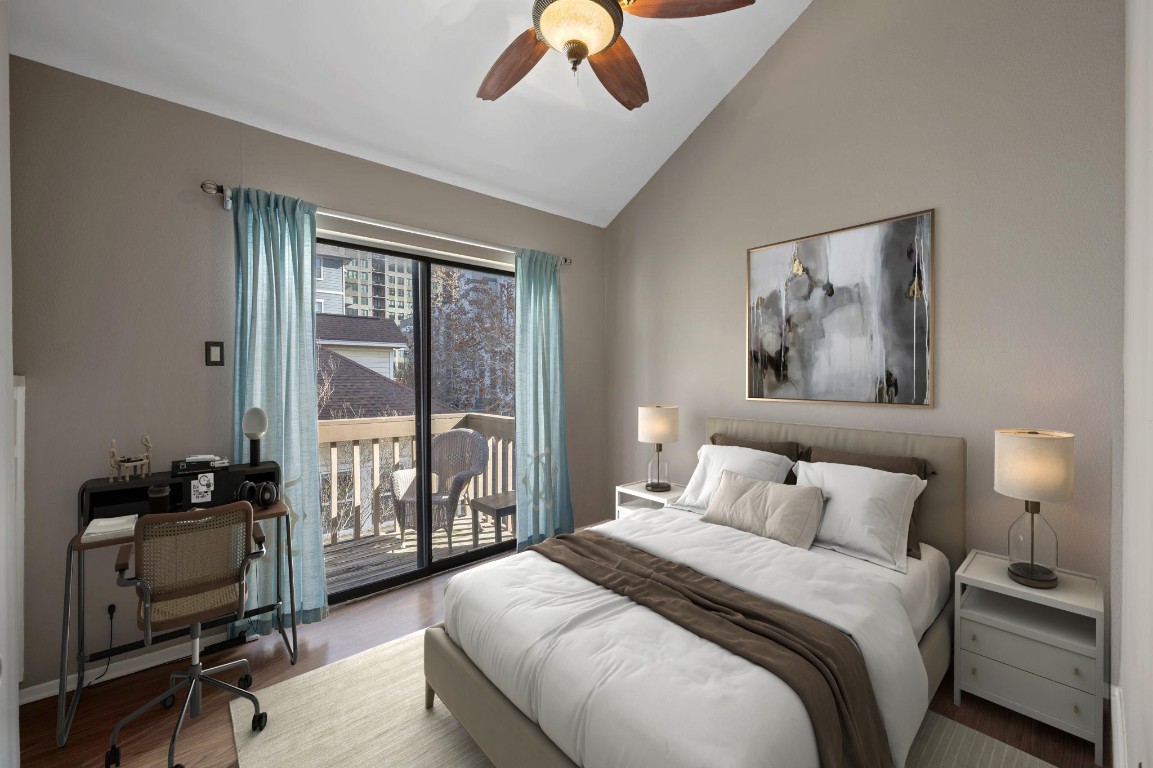 2210 Pearl Street, Unit 301 Austin, TX 78705 - Photo 12 of 35 a bedroom with a bed and a large window