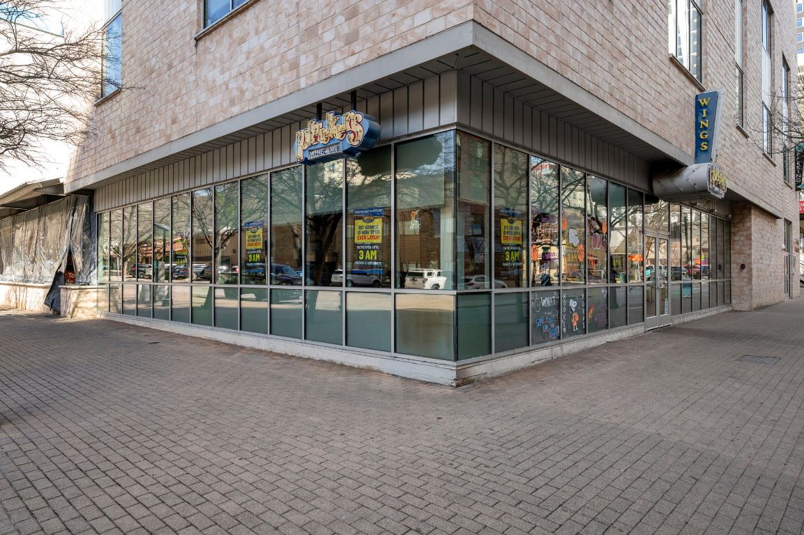 2210 Pearl Street, Unit 301 Austin, TX 78705 - Photo 25 of 35 a view of a building with a glass door