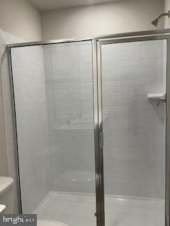 74 Alexander Way Westampton, NJ 08060 - Photo 18 of 30 a bathroom with a glass shower door