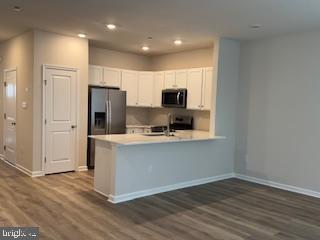 74 Alexander Way Westampton, NJ 08060 - Photo 2 of 30 a kitchen with stainless steel appliances a refrigerator microwave and sink