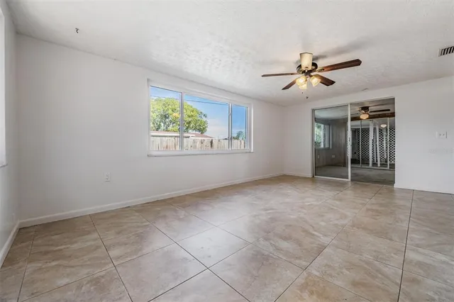 a kitchen with stainless steel appliances a refrigerator and a stove