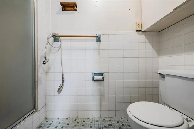 a view of a hallway with seating area