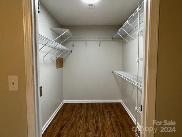 505 2nd St Place Northeast, Unit E4 Conover, NC 28613 - Photo 14 of 17 a view of a room with wooden floor and front door