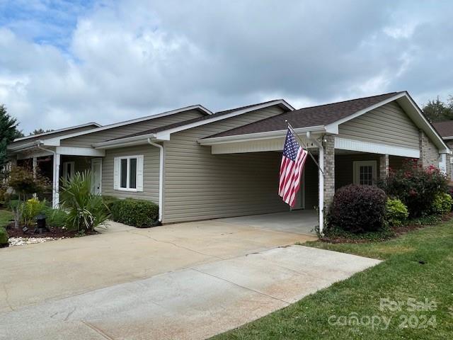 505 2nd St Place Northeast, Unit E4 Conover, NC 28613 - Photo 2 of 17 a view of a house with backyard and garden