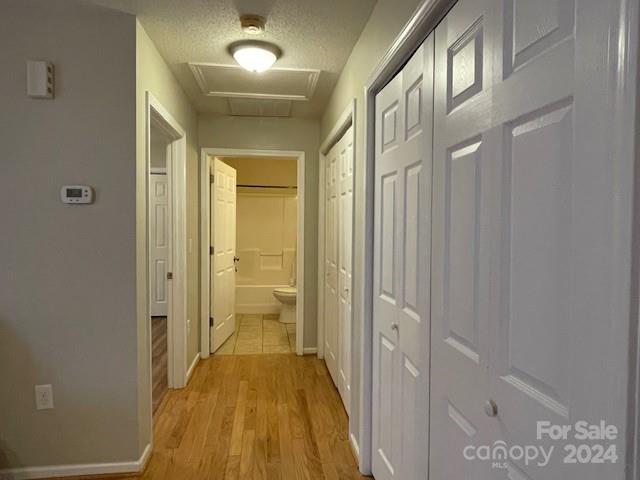 505 2nd St Place Northeast, Unit E4 Conover, NC 28613 - Photo 8 of 17 a bathroom with a sink and a glass door shower