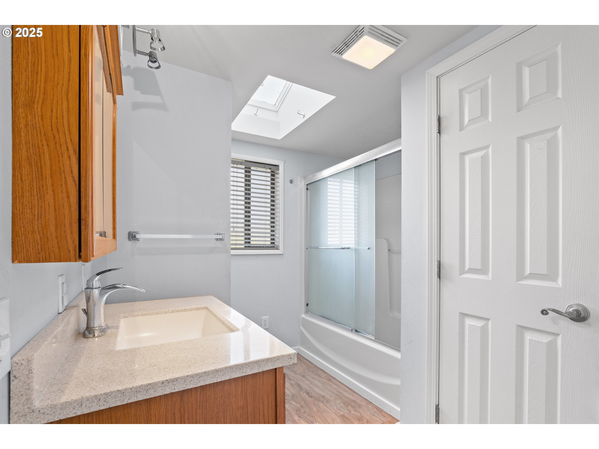 1021 Deal Street Junction City, OR 97448 - Photo 21 of 43 a bathroom with a sink and a mirror