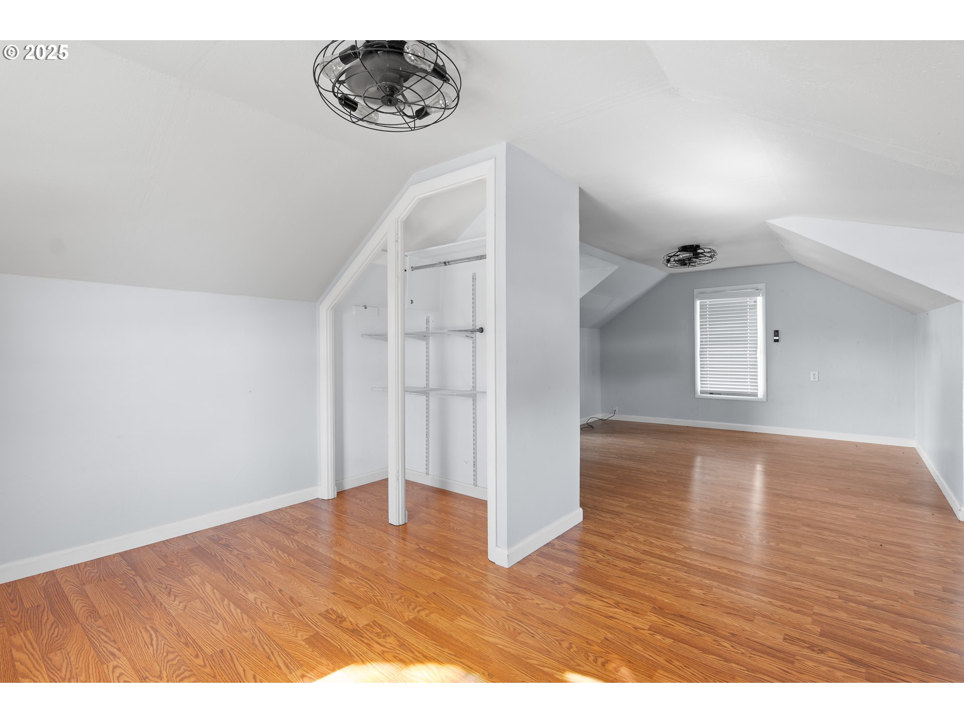 1021 Deal Street Junction City, OR 97448 - Photo 25 of 43 a view of an empty room with wooden floor