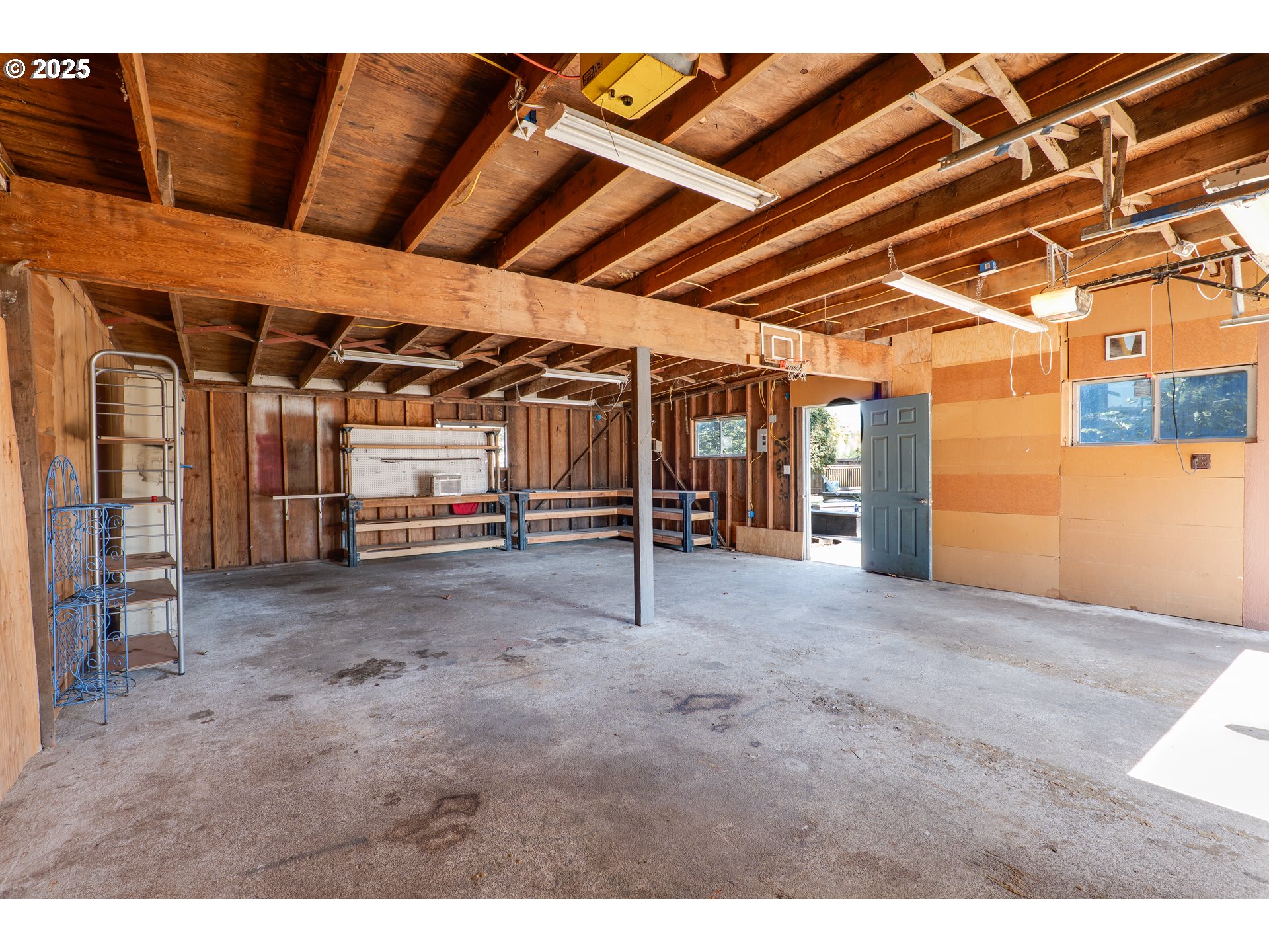 1021 Deal Street Junction City, OR 97448 - Photo 28 of 43 a view of an empty room with wooden walls