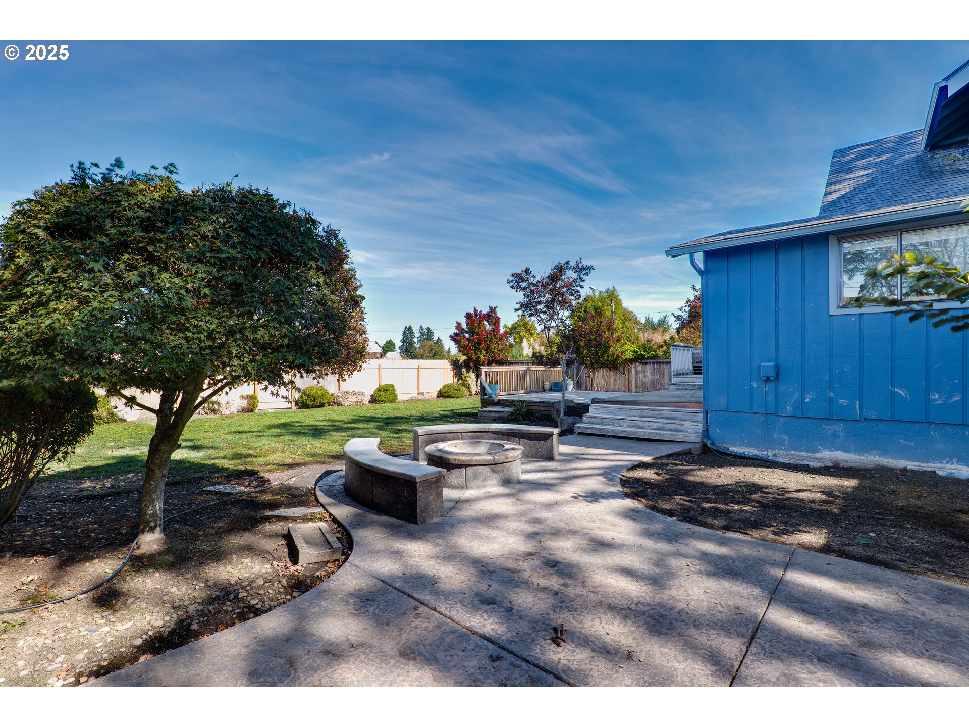 1021 Deal Street Junction City, OR 97448 - Photo 31 of 43 a view of a backyard with plants and outdoor seating