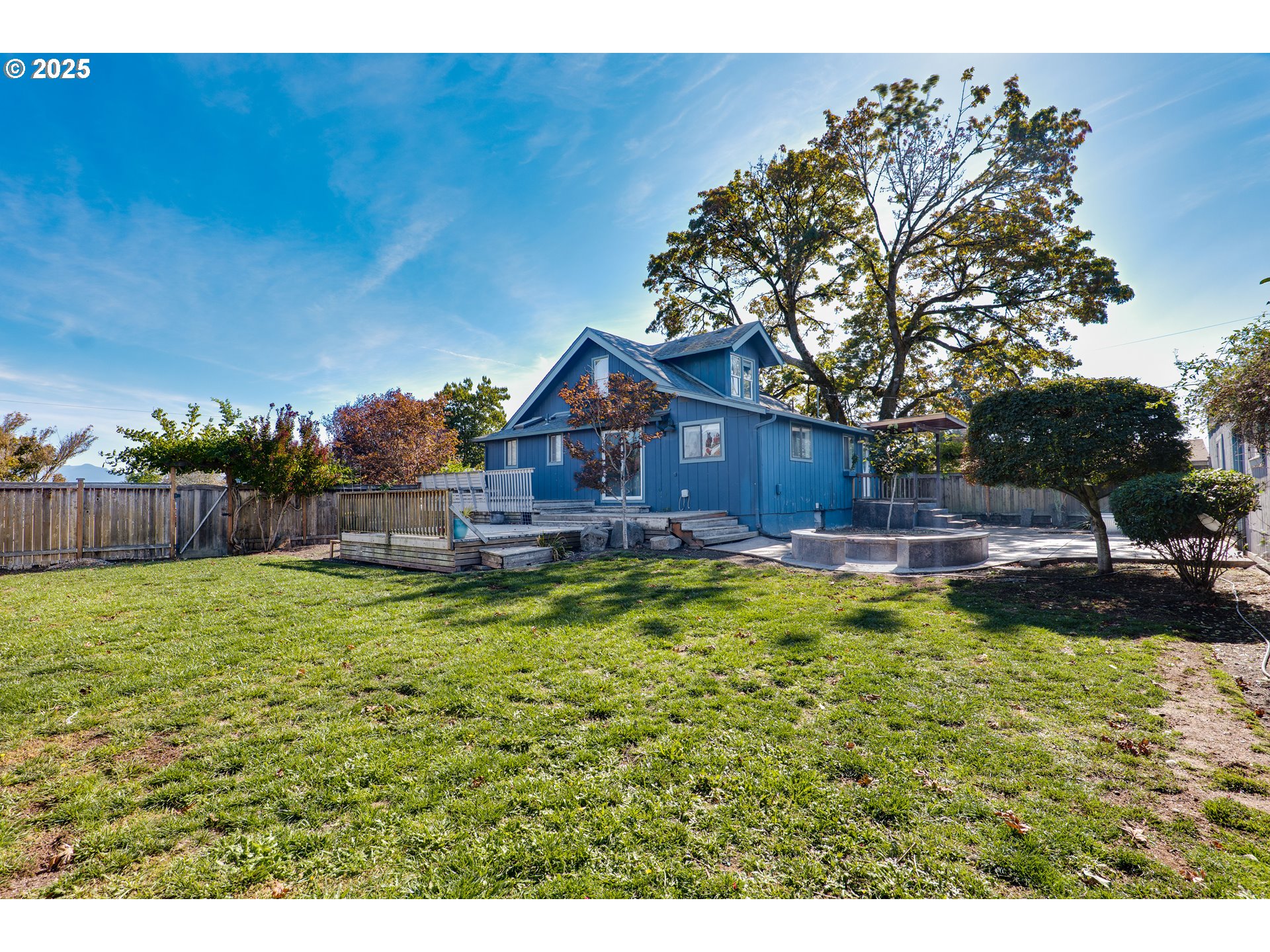 1021 Deal Street Junction City, OR 97448 - Photo 32 of 43 a swimming pool with outdoor seating and yard