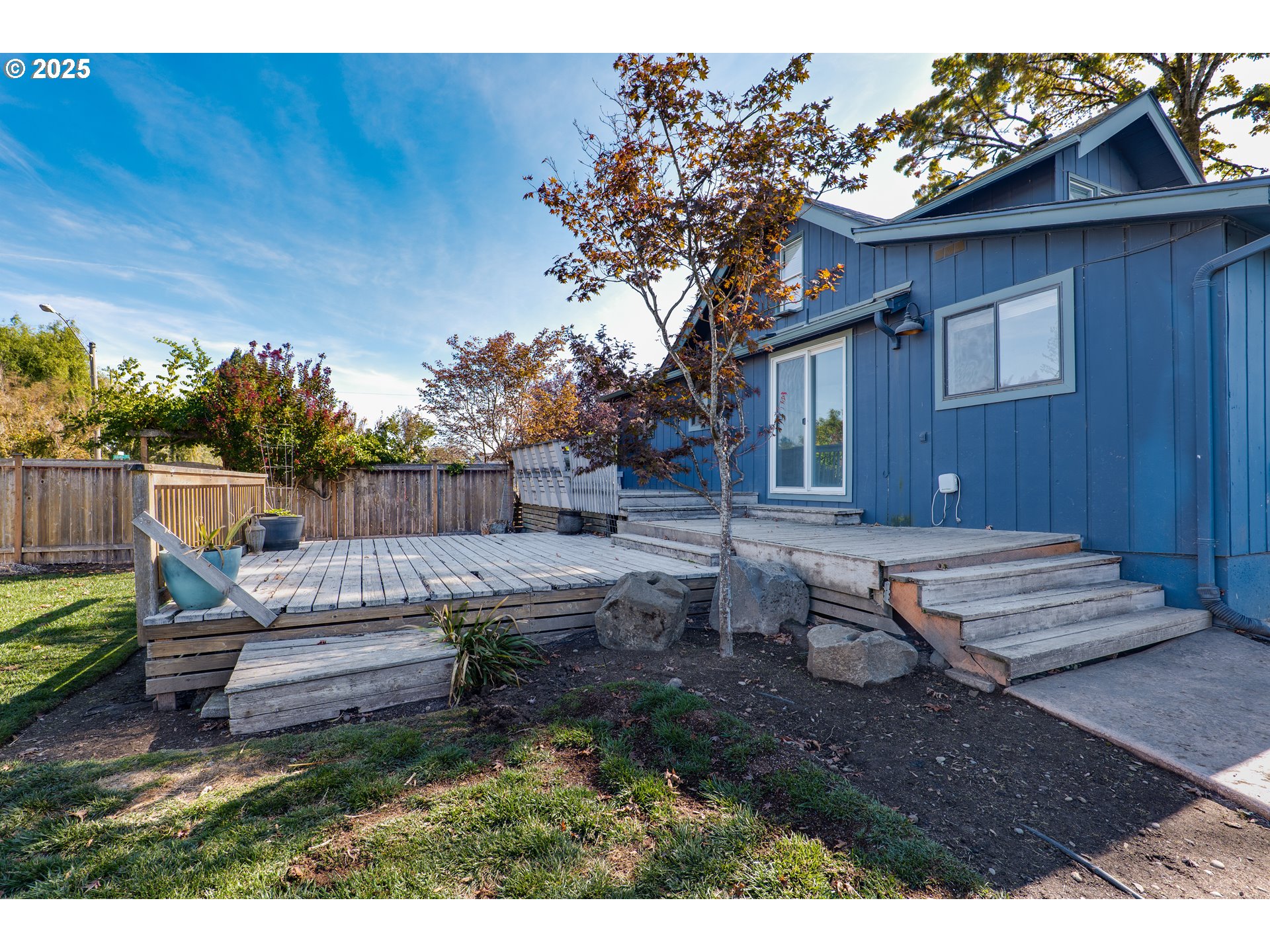 1021 Deal Street Junction City, OR 97448 - Photo 33 of 43 a view of backyard with deck and seating space