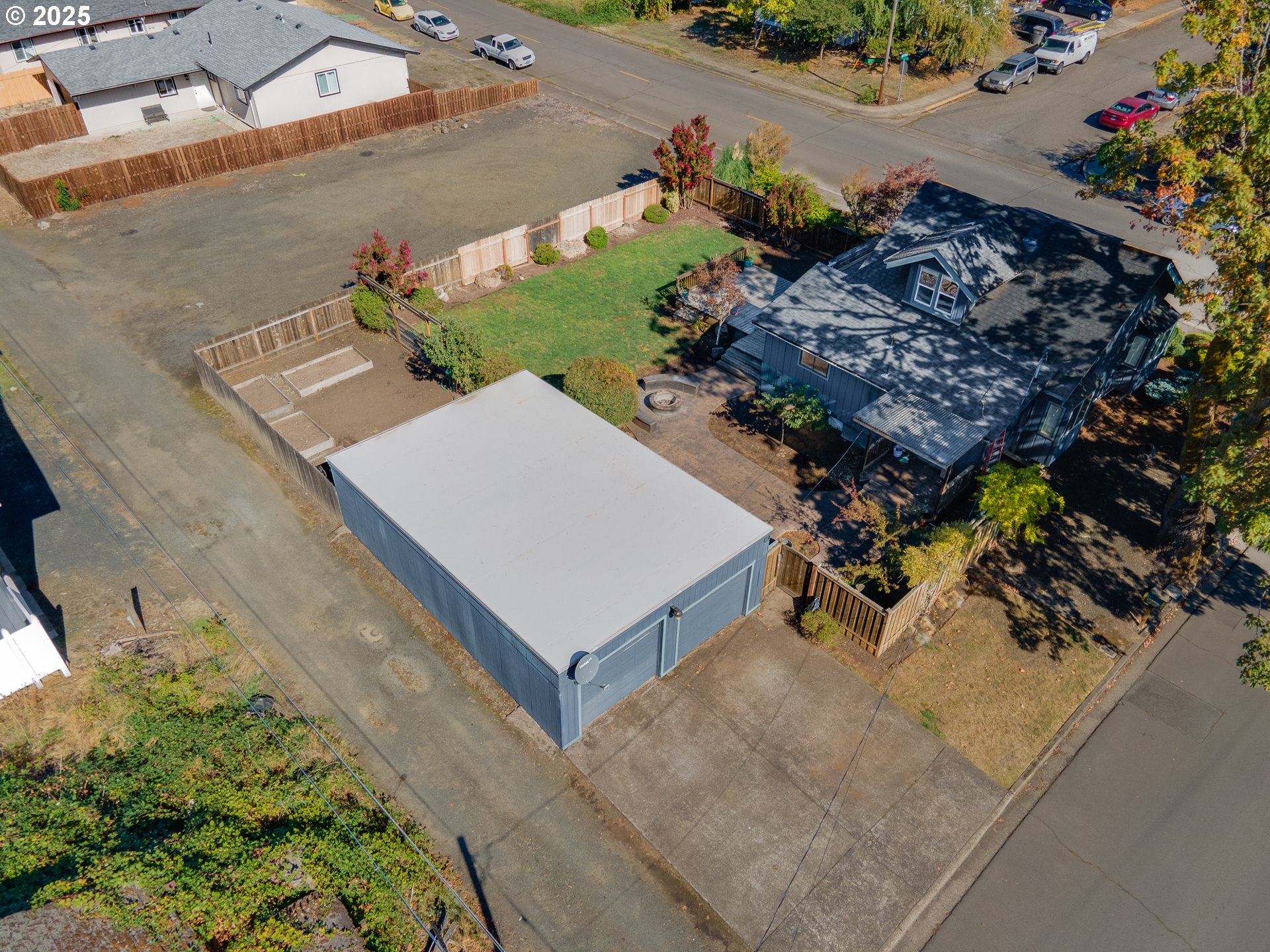 1021 Deal Street Junction City, OR 97448 - Photo 42 of 43 an aerial view of a house having yard