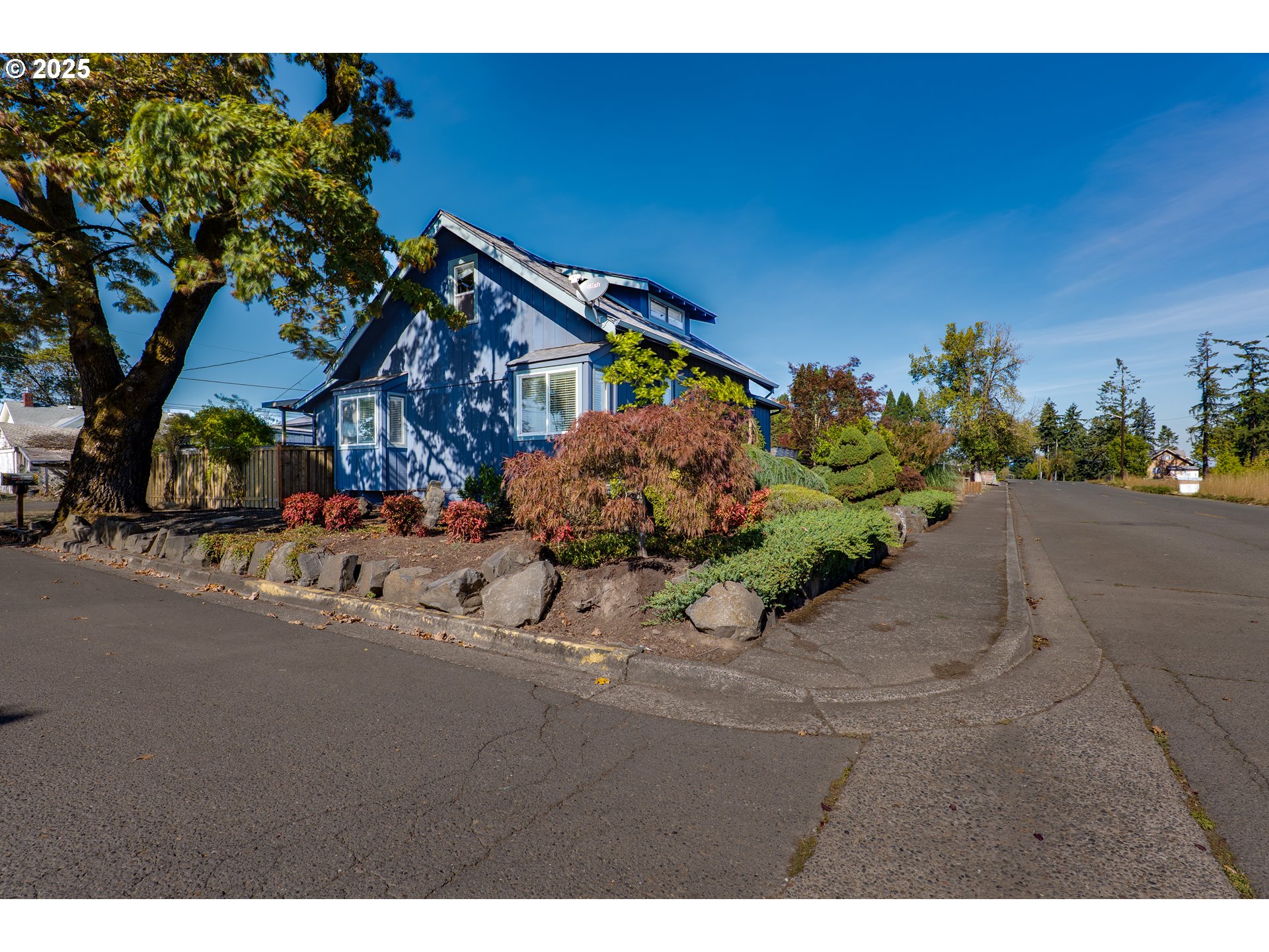 1021 Deal Street Junction City, OR 97448 - Photo 6 of 43 a picture of a road with a building in the background