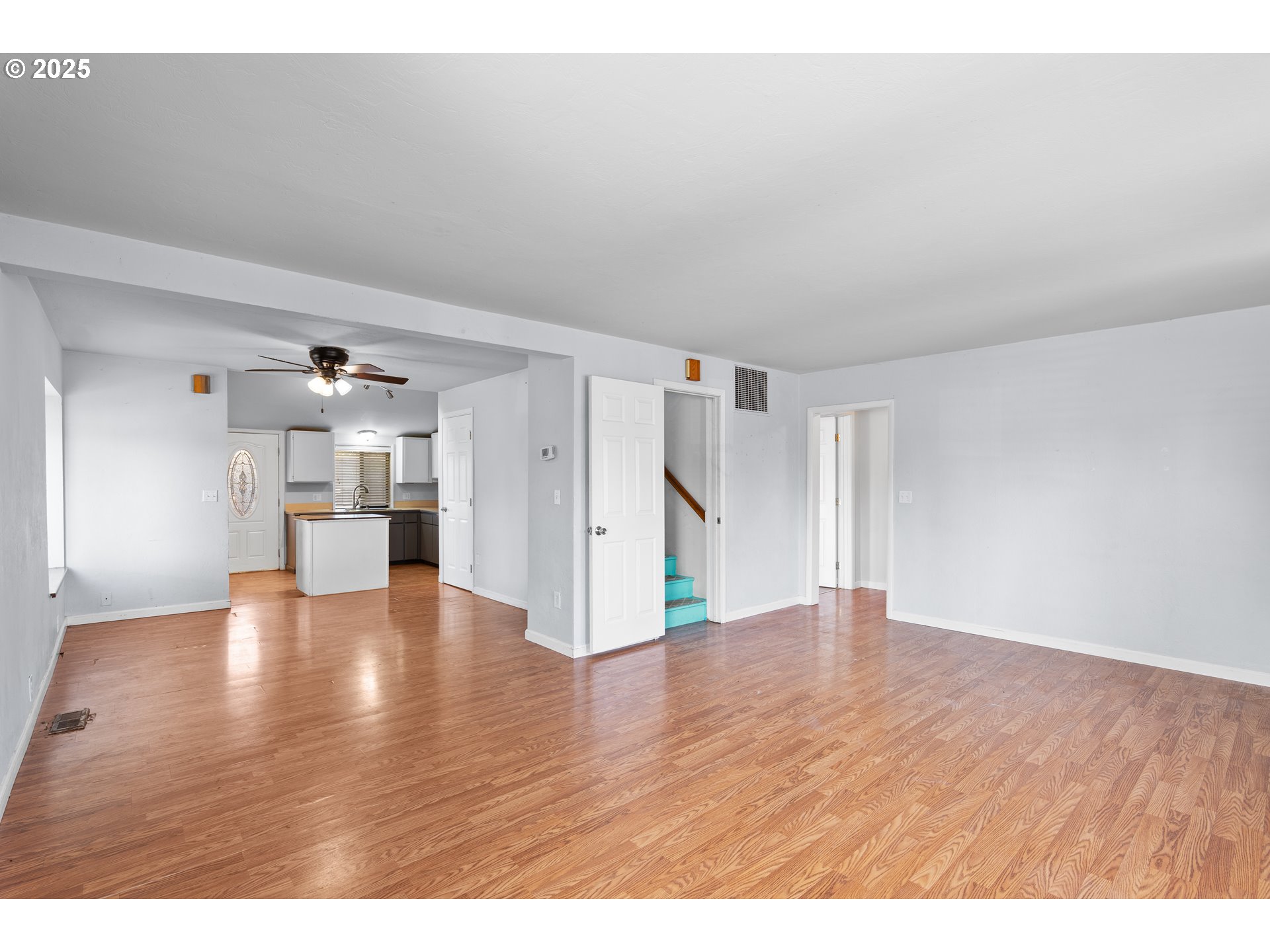 1021 Deal Street Junction City, OR 97448 - Photo 9 of 43 a view of an empty room and wooden floor