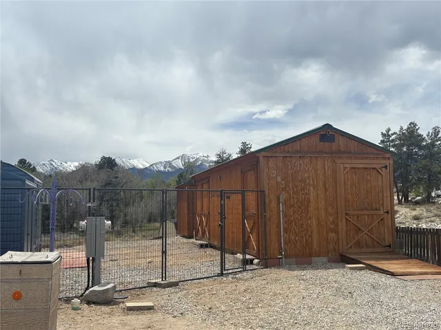 a view of a chairs setting on the deck