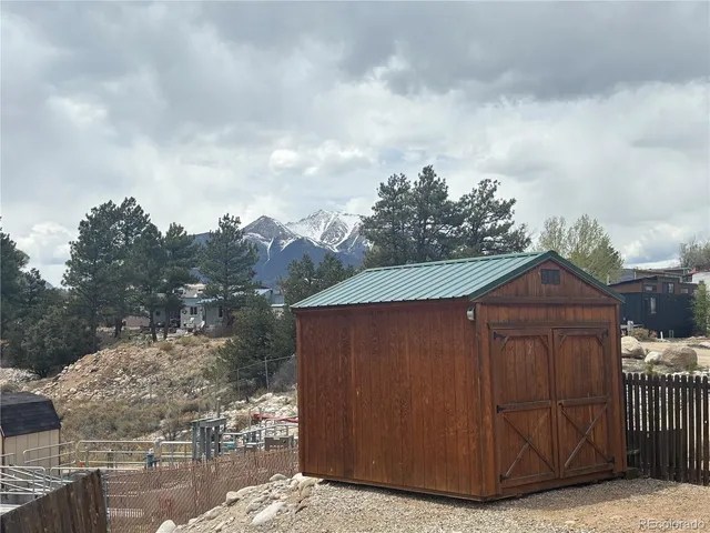 a room with gym equipment and a large window