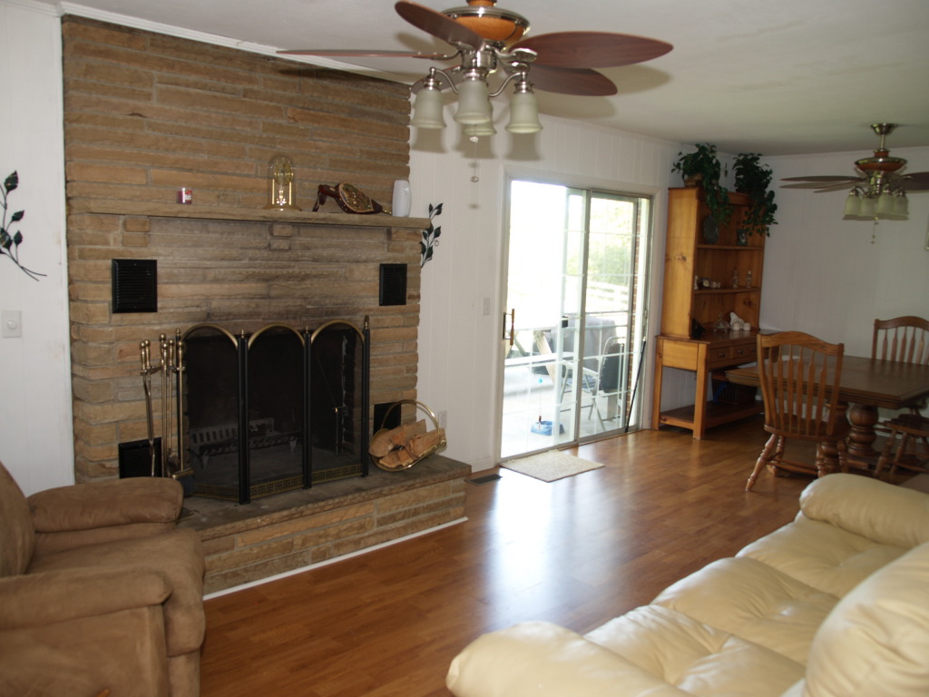 1545 River Ridge Road Southeast Floyd, VA 24091 - Photo 7 of 16 a living room with furniture and a fireplace