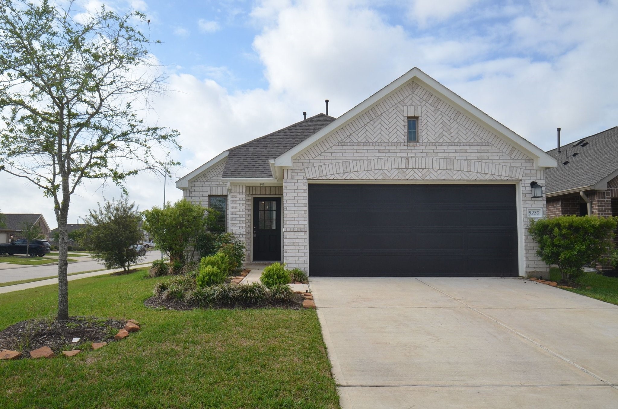 8230 Blue Fish Drive Cypress, TX 77433 - Photo 4 of 18 Double wide driveway allows for lots of parking.