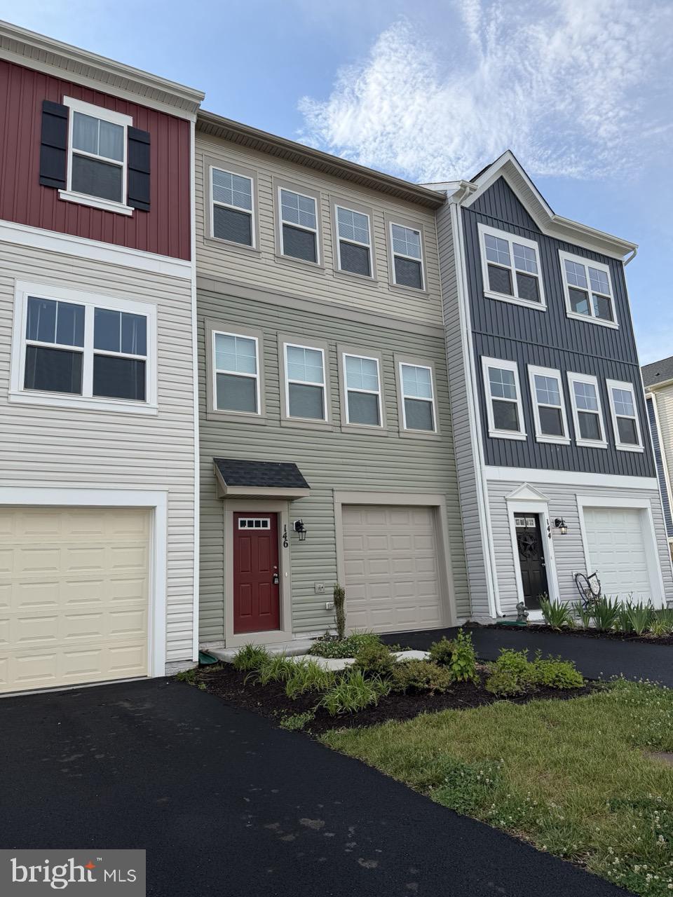 146 Galaxy Place Stephenson, VA 22656 - Photo 2 of 46 a front view of a house with garden