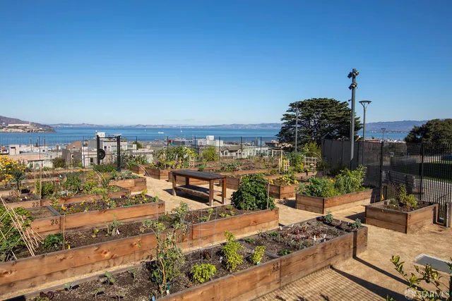 a view of swimming pool with outdoor seating and yard