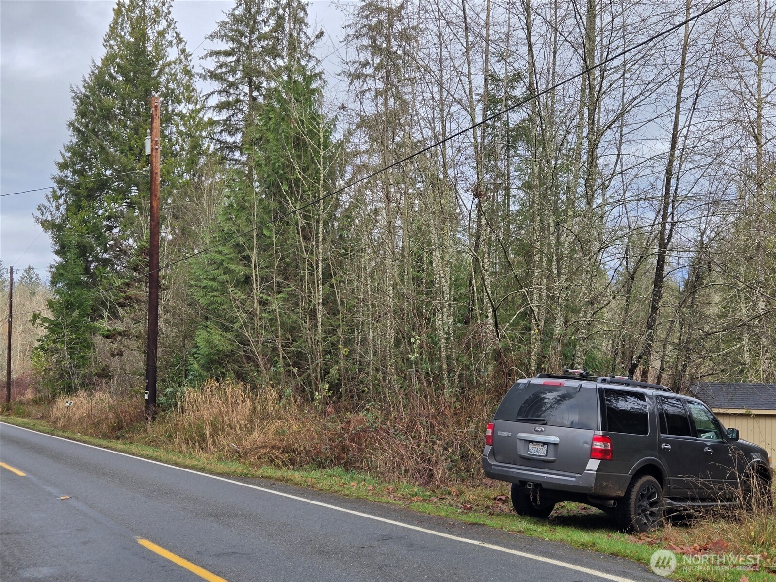 2121 Creswell Road Snohomish, WA 98290 - Photo 18 of 21 a car parked in front of a house