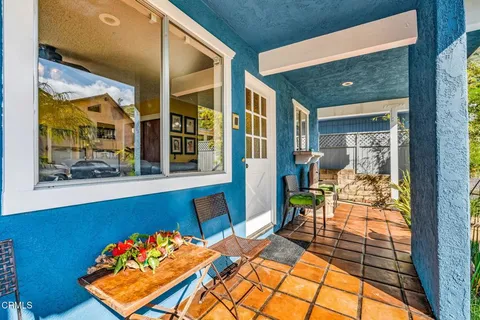 a living room with furniture or couch and a ceiling fan