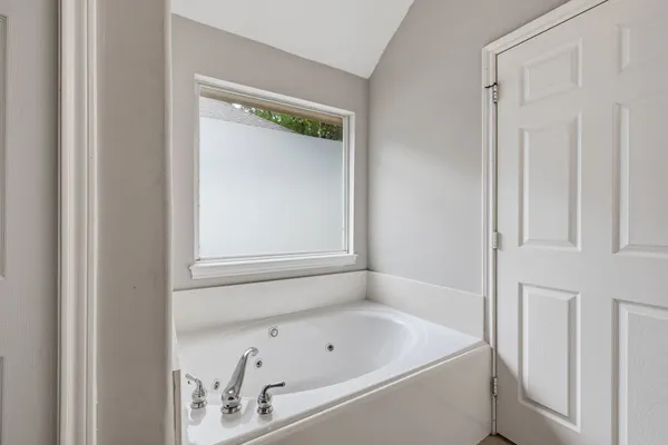 a bathroom with a sink toilet tub and shower