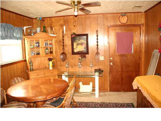 121 Roberts Road DeFuniak Springs, FL 32433 - Photo 3 of 11 a view of a living room and bathroom