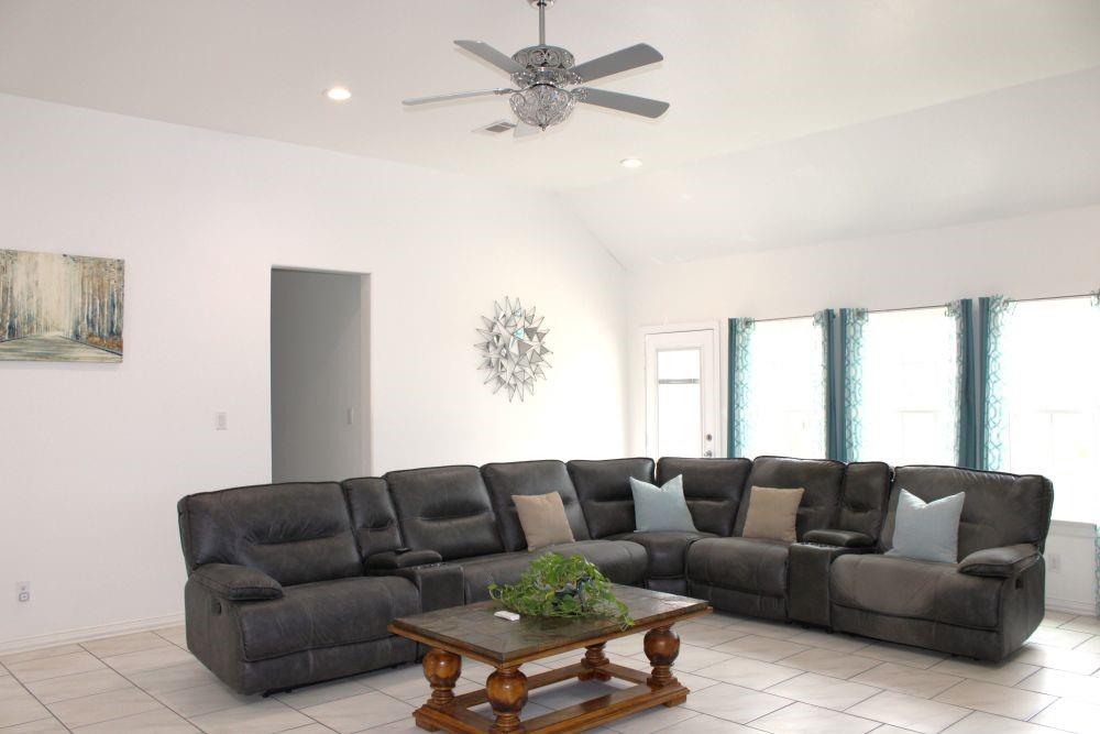 7320 County Road 3512 Quinlan, TX 75474 - Photo 12 of 35 a living room with furniture and a large window