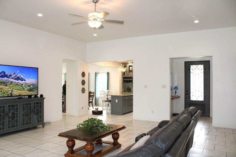 7320 County Road 3512 Quinlan, TX 75474 - Photo 13 of 35 a living room with furniture and wooden floor