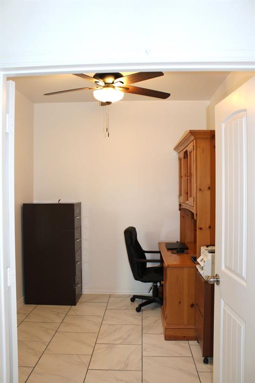 7320 County Road 3512 Quinlan, TX 75474 - Photo 17 of 35 a view of workspace with lounge chair