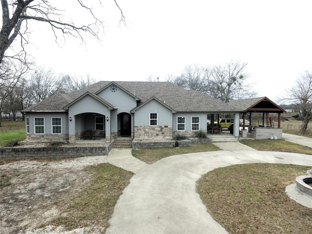 7320 County Road 3512 Quinlan, TX 75474 - Photo 2 of 35 a view of a yard in front of house