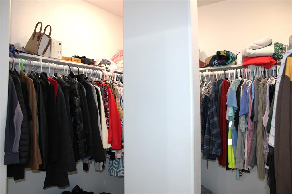 7320 County Road 3512 Quinlan, TX 75474 - Photo 22 of 35 a view of walk in closet with clothes and shoes