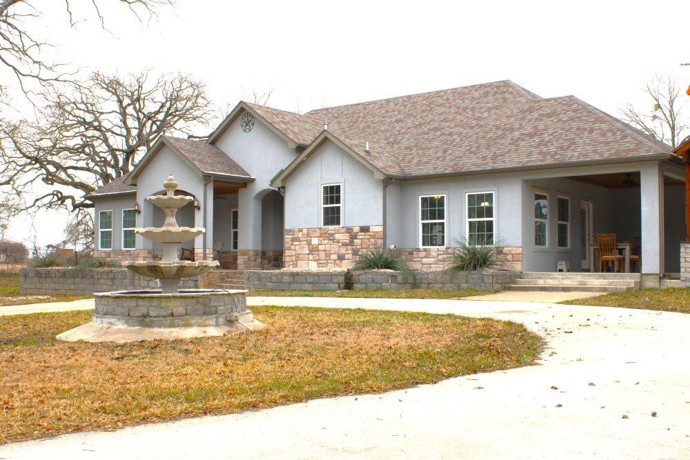 7320 County Road 3512 Quinlan, TX 75474 - Photo 3 of 35 a view of a house with swimming pool and a yard