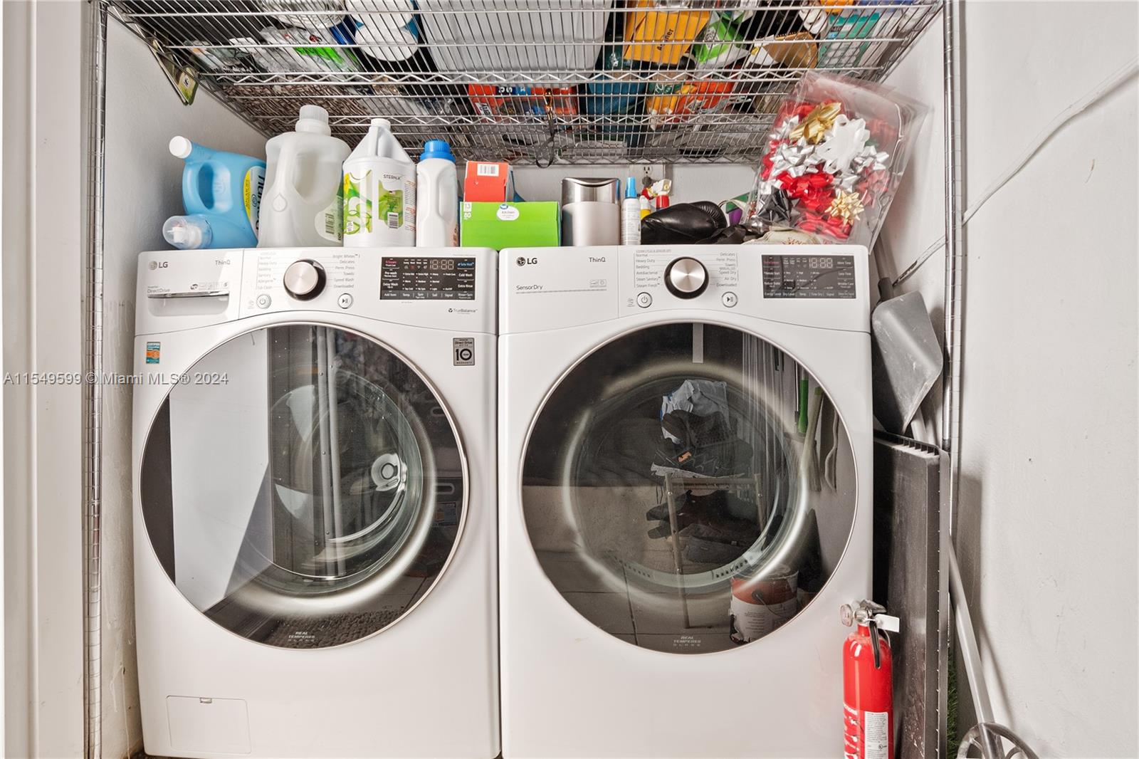 5819 Southwest 4th Street Miami, FL 33144 - Photo 13 of 27 a utility room with dryer and washer