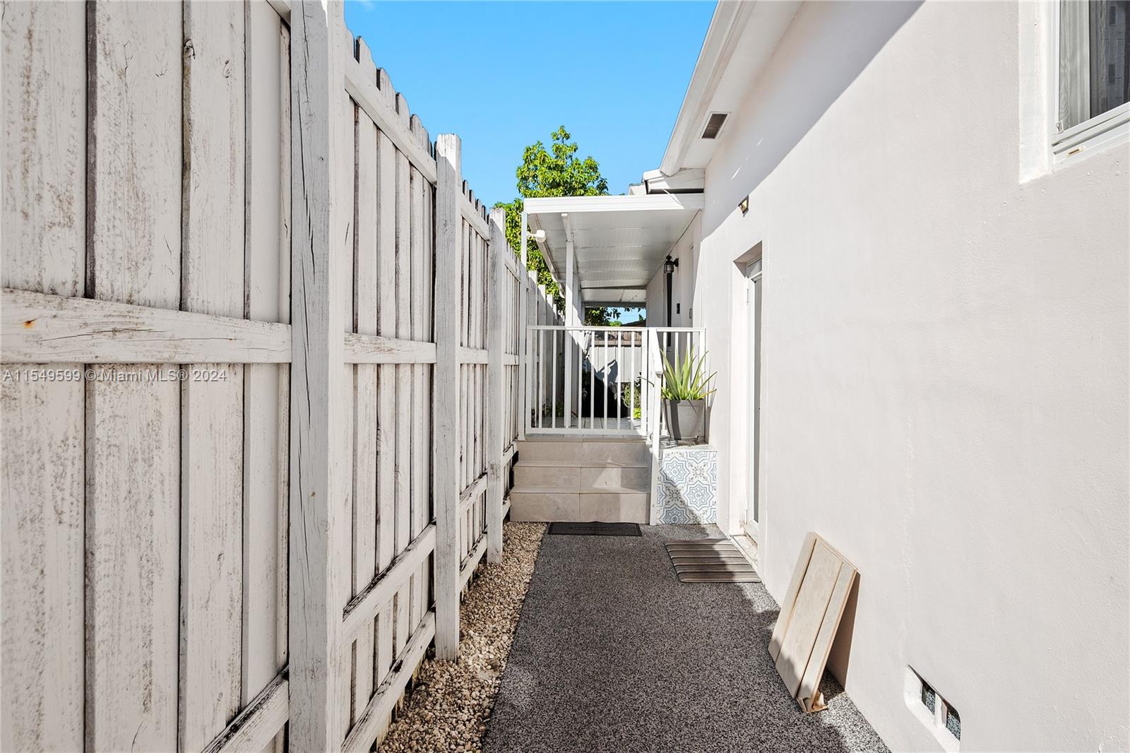 5819 Southwest 4th Street Miami, FL 33144 - Photo 14 of 27 a view of an entryway with staircase