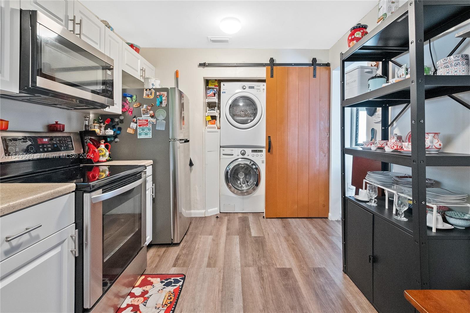 5819 Southwest 4th Street Miami, FL 33144 - Photo 20 of 27 a utility room with dryer and washer