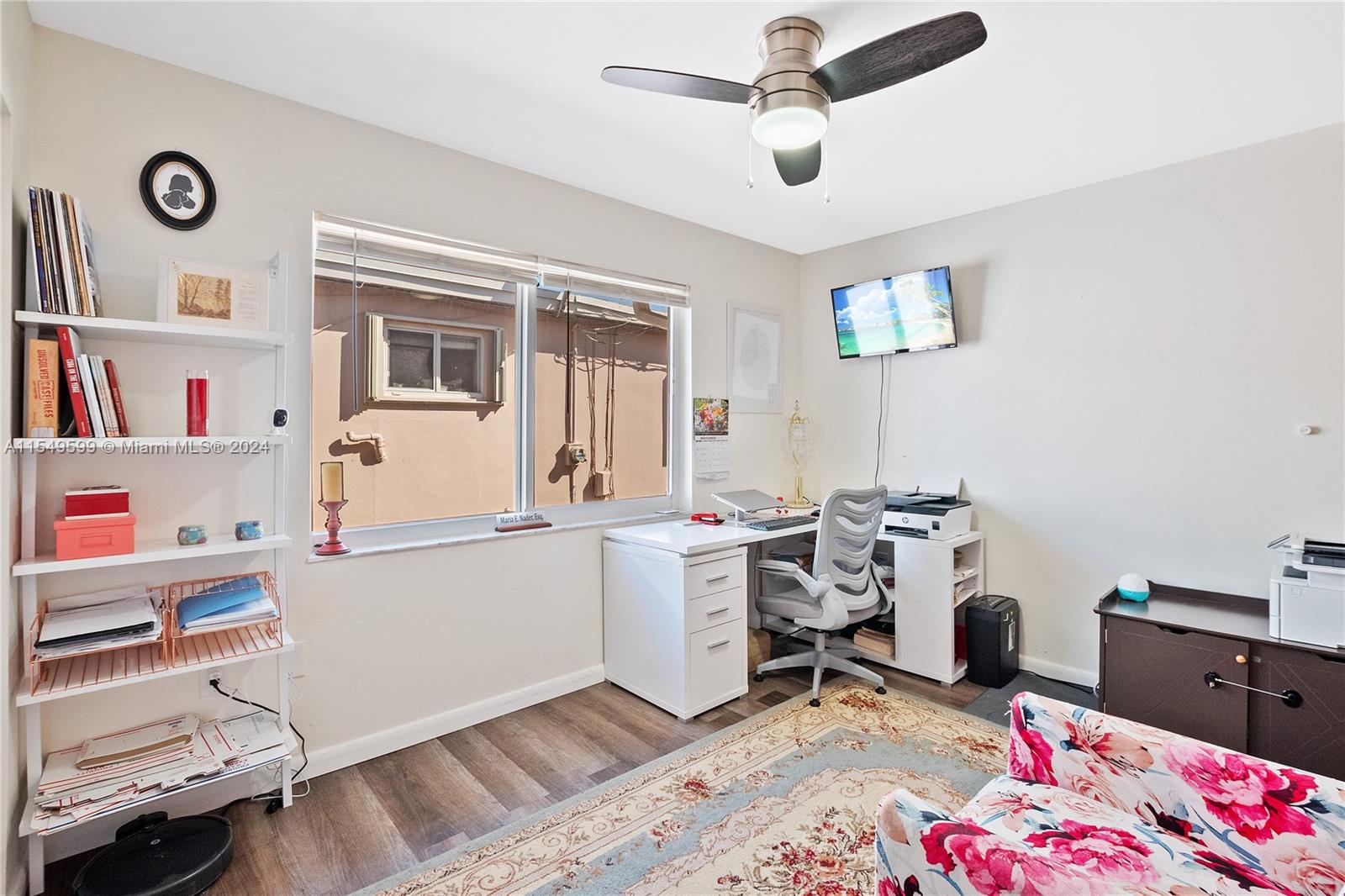 5819 Southwest 4th Street Miami, FL 33144 - Photo 23 of 27 a workspace with furniture and window