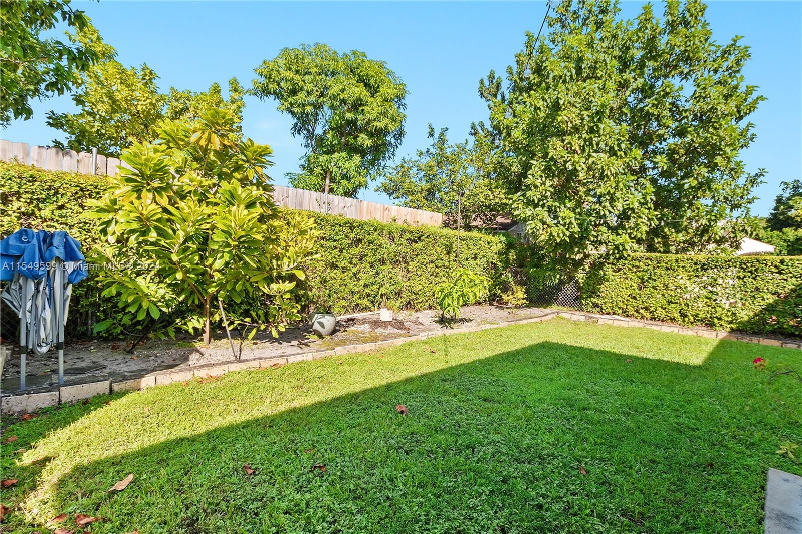 5819 Southwest 4th Street Miami, FL 33144 - Photo 27 of 27 a view of yard with large trees