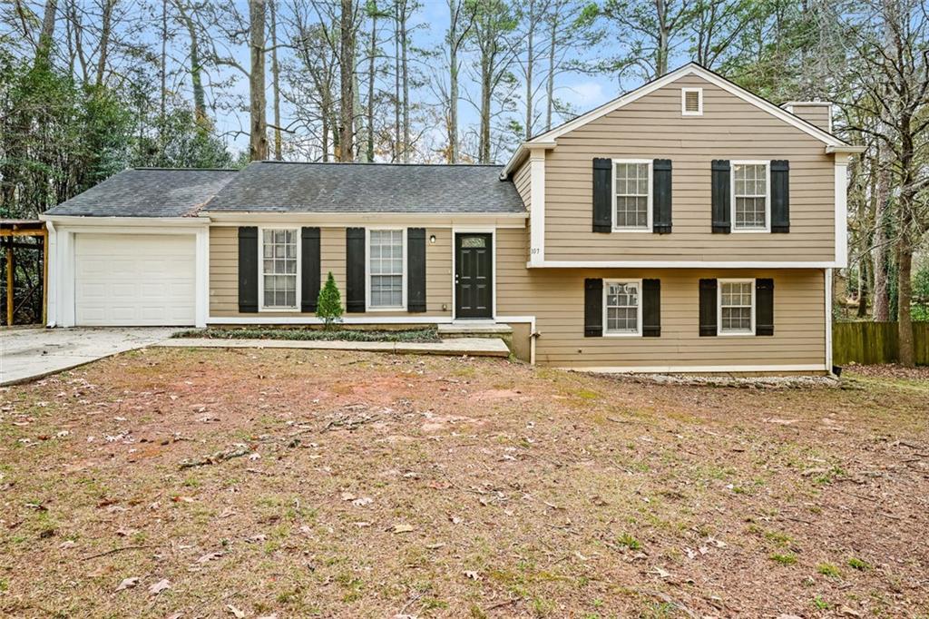 107 Parkview Drive Stockbridge, GA 30281 - Photo 2 of 25 front view of a house with a yard