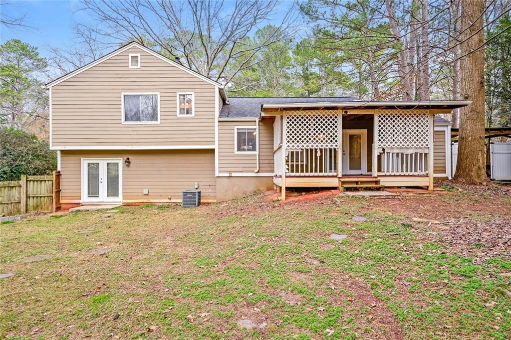 107 Parkview Drive Stockbridge, GA 30281 - Photo 4 of 25 front view of a house with a fence