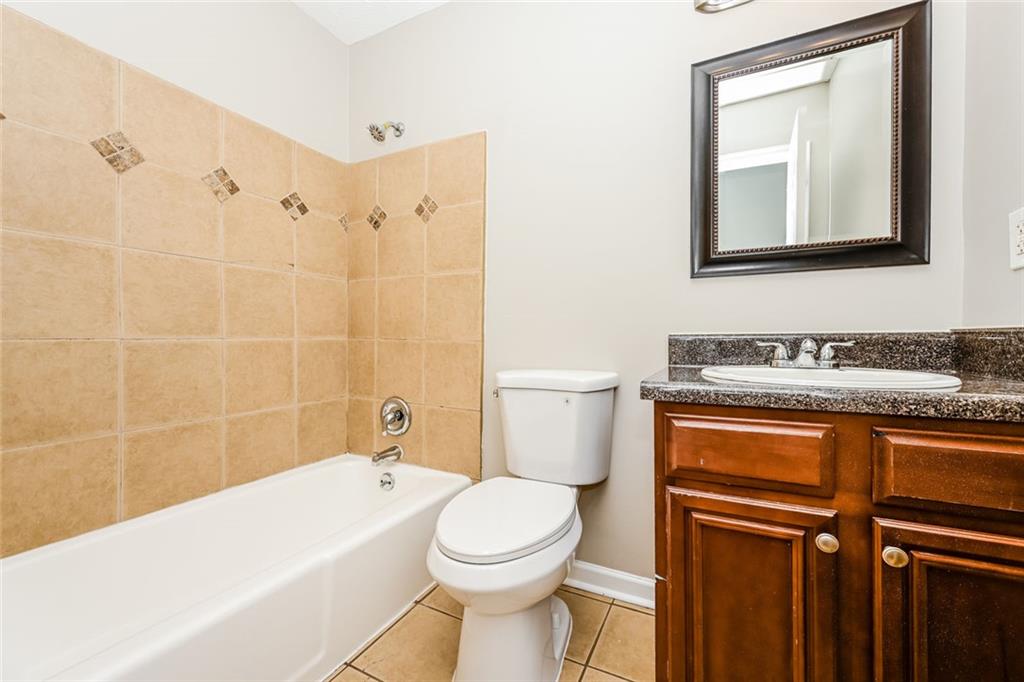 107 Parkview Drive Stockbridge, GA 30281 - Photo 8 of 25 a bathroom with a sink a toilet and shower