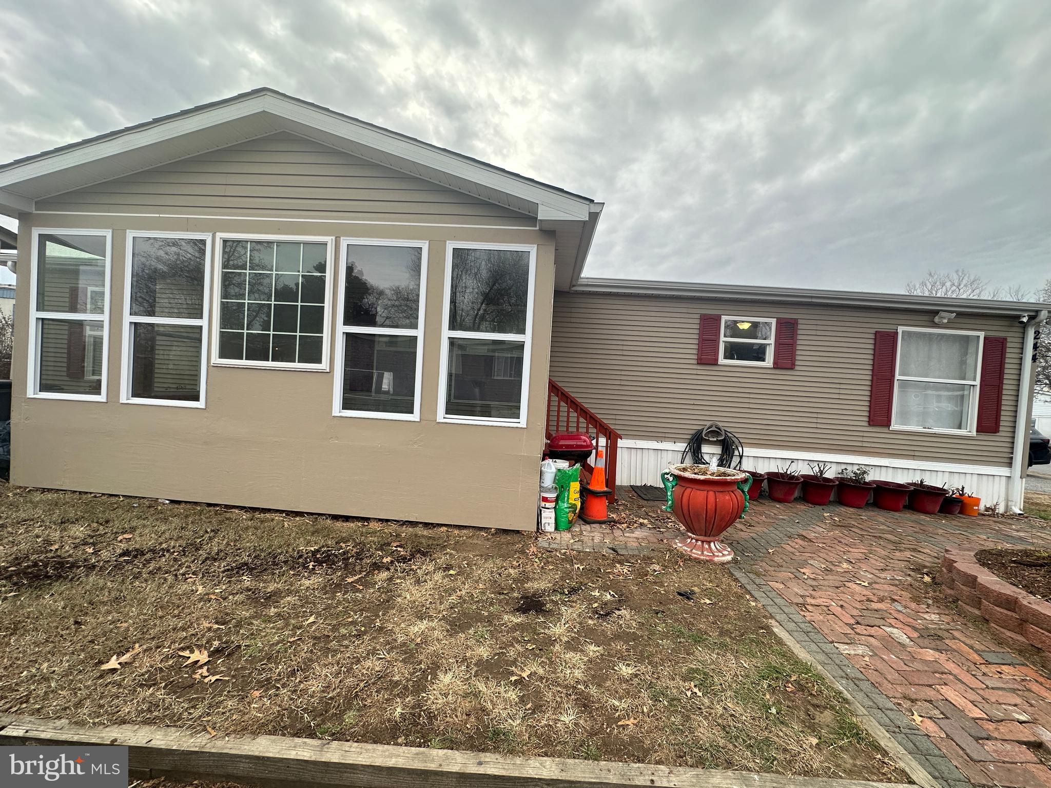 a front view of a house with yard