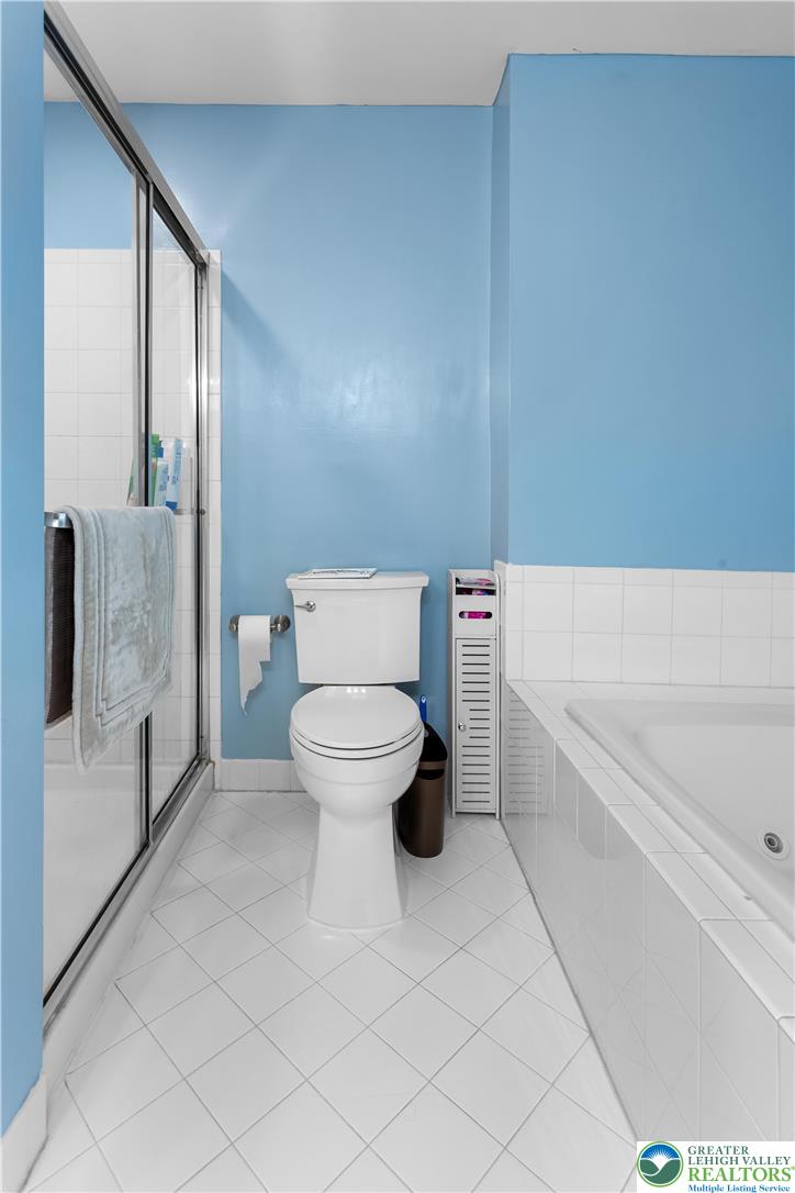 3420 Westminster Way Nazareth, PA 18064 - Photo 11 of 21 a bathroom with a toilet and a shower