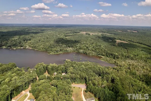 a view of a lake with a city