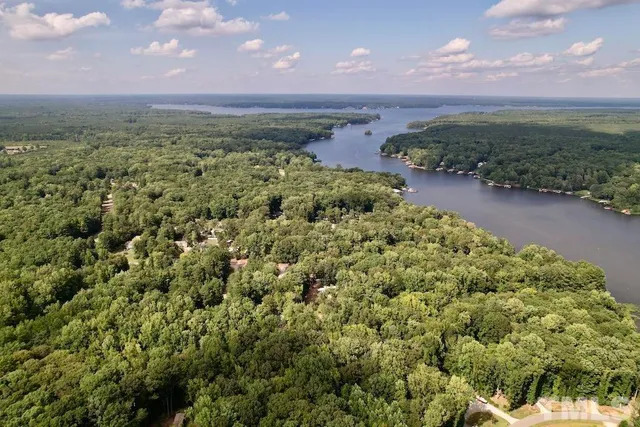 a view of a lake with a yard
